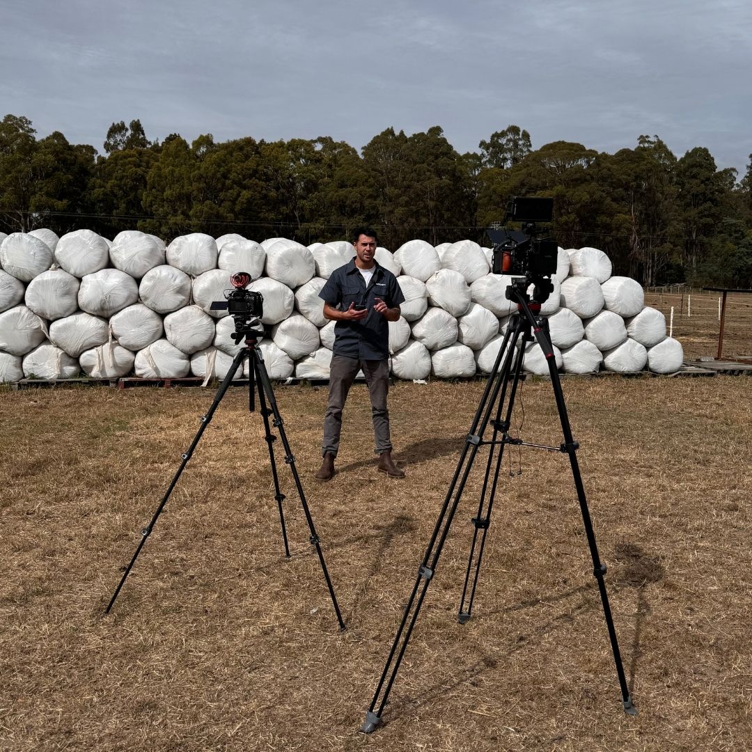Aus Agro mini hay making equipment in a paddock